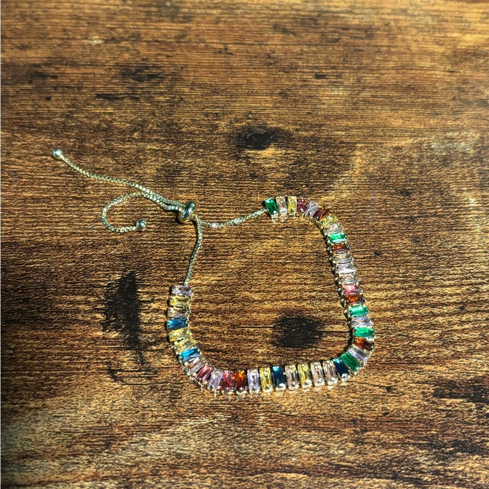 BaubleBar adjustable gold tennis bracelet w/ multicolored cubic zirconia stones